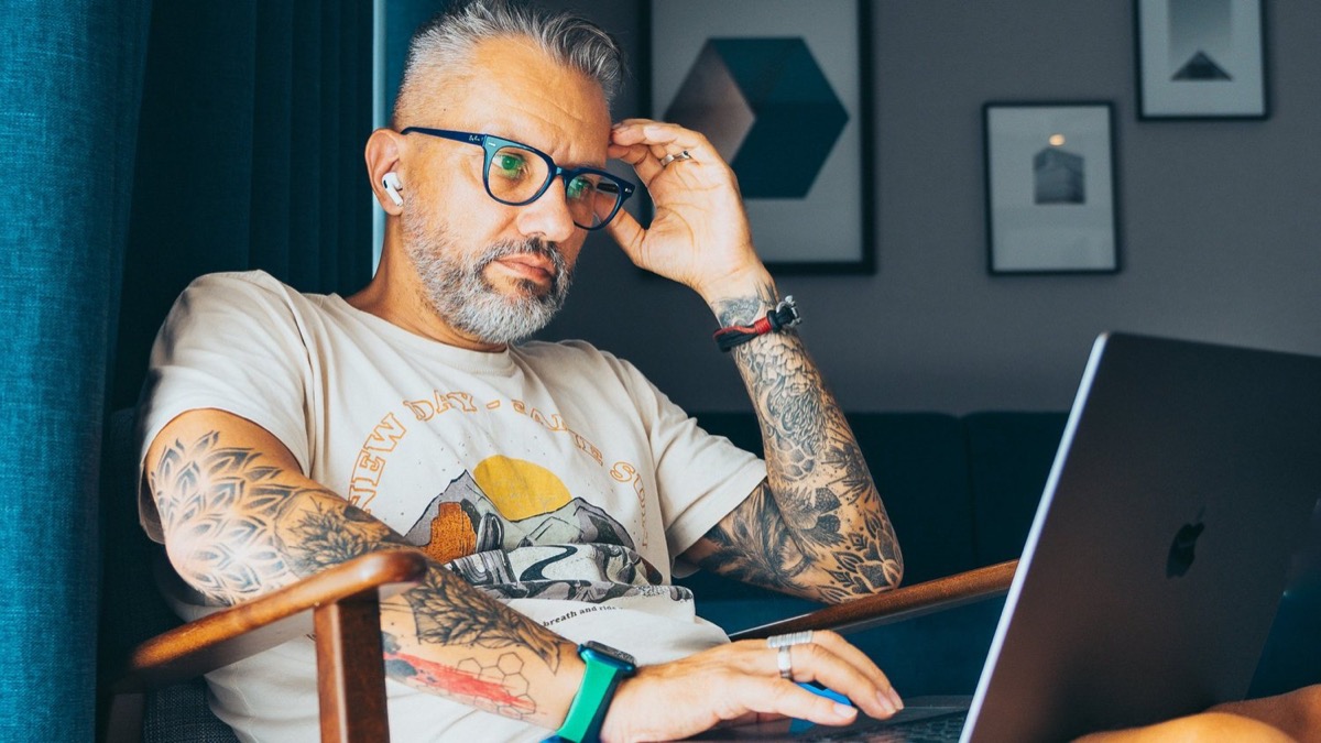 Aivars Meijers working on a laptop